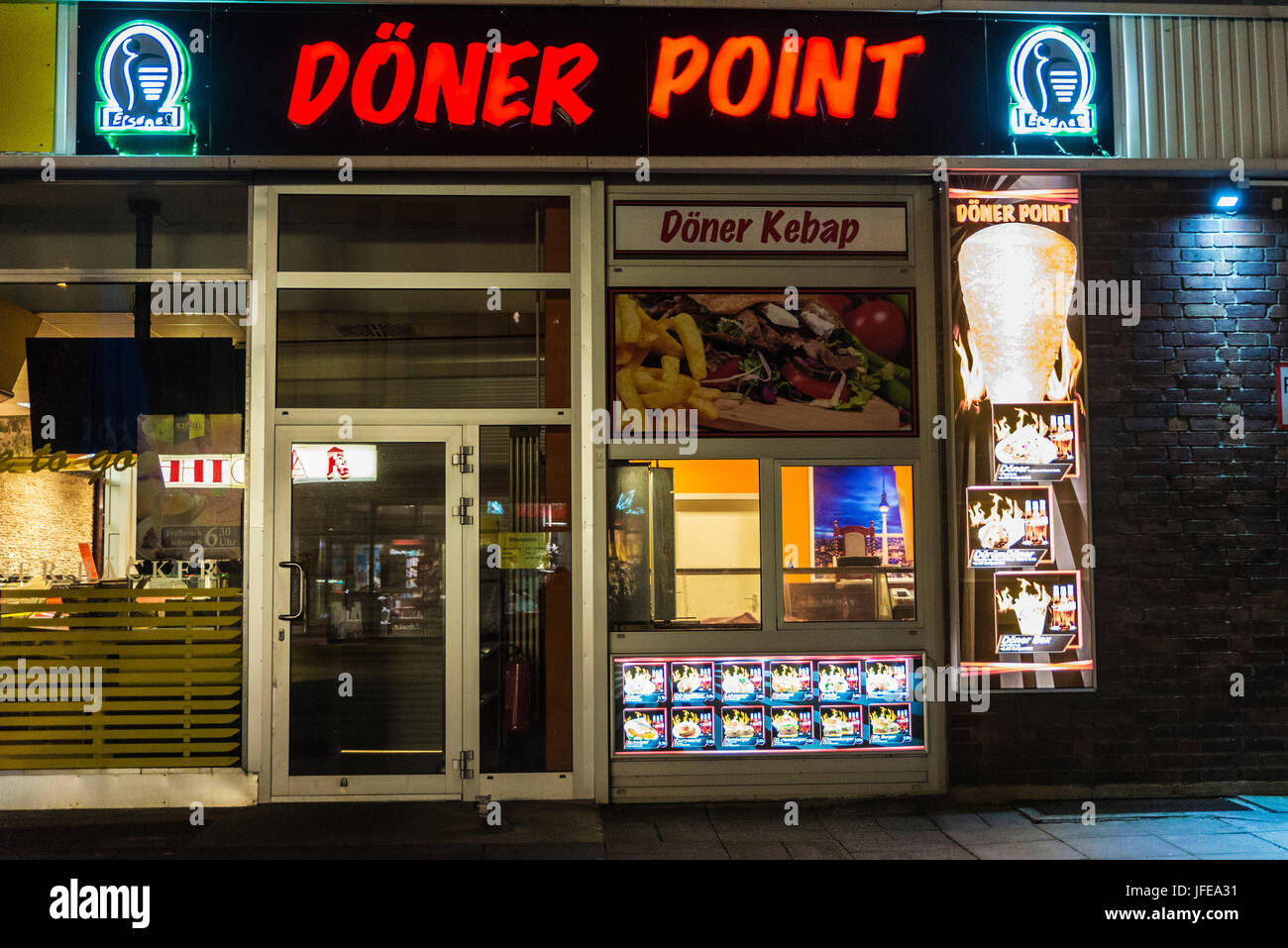 Berlin, Germany - April 14, 2017: Facade of a Doner kebap at night in Berlin, Germany Stock Photo