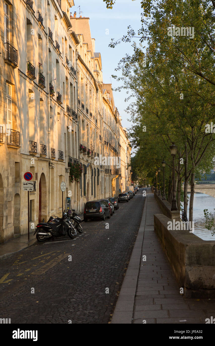 A narrow street in Ile Saint Louis, along the Seine River. Stock Photo