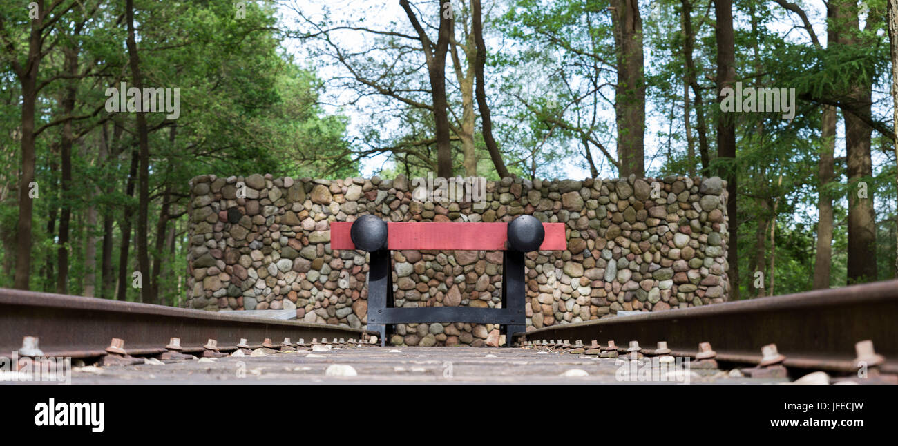red railroad buffer end to destination of the railraod track Stock Photo