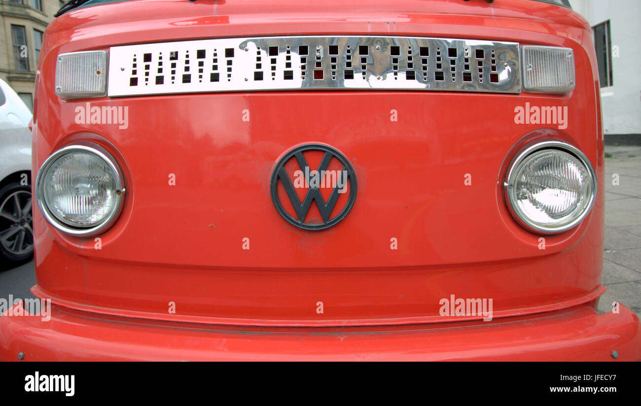 detail of Volkswagen caravan van truck classic badge bonnet front red burnt sienna Stock Photo