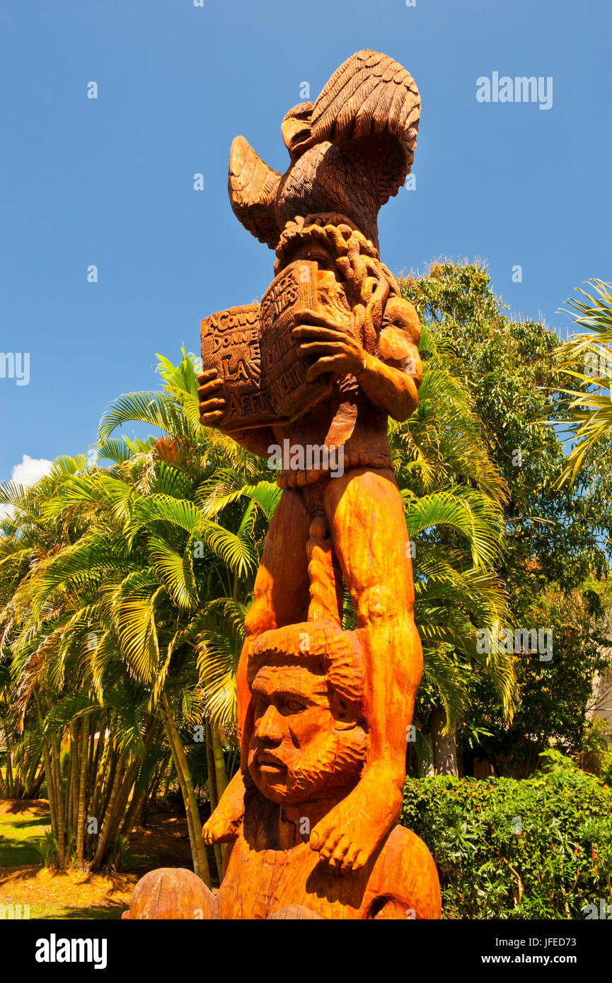 Wooden statues in the sculptures garden of La Foa, West coast of Grand