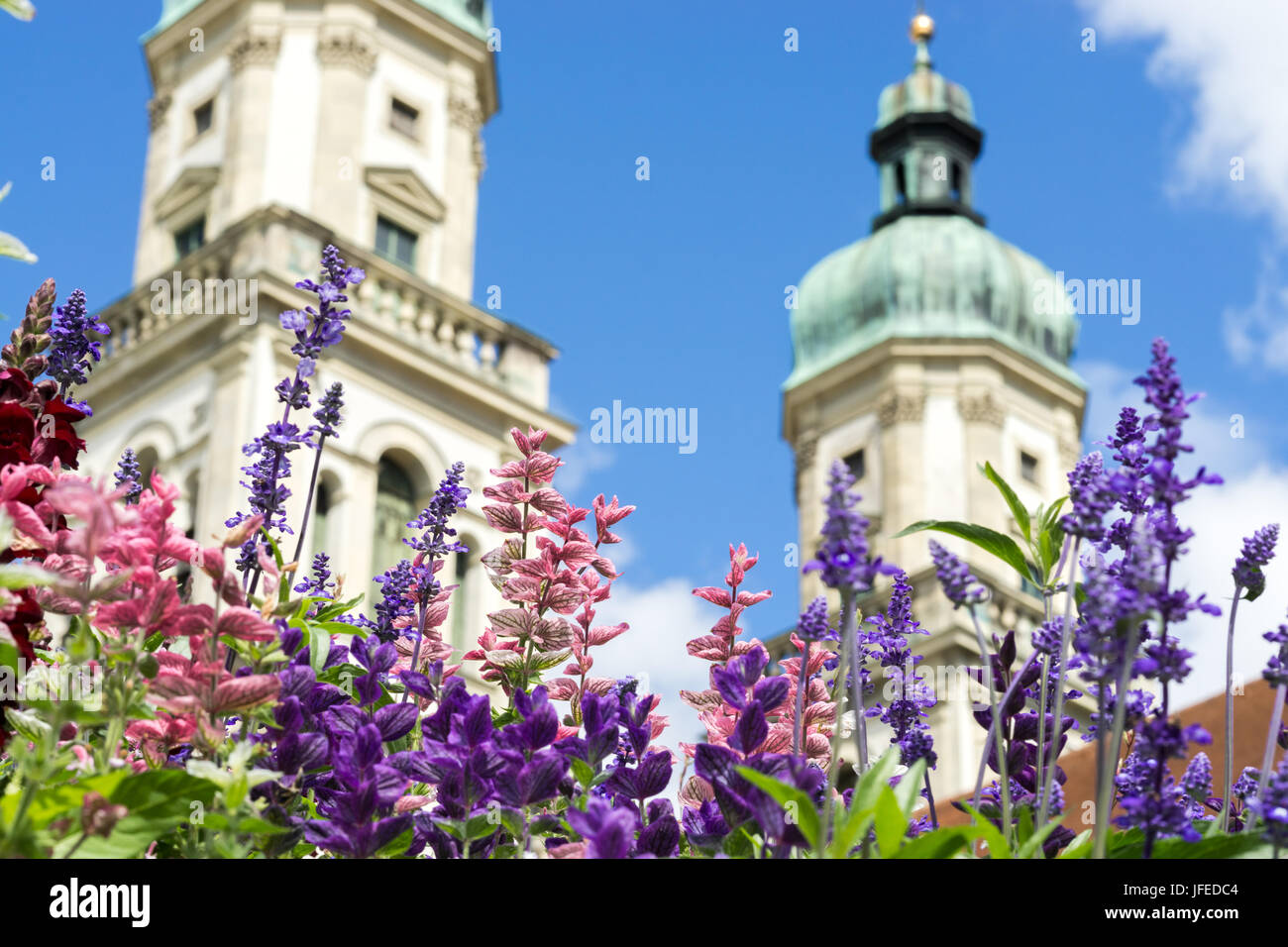 Greeting Card with colorful flower and church. Beautiful summer flowers. Stock Photo