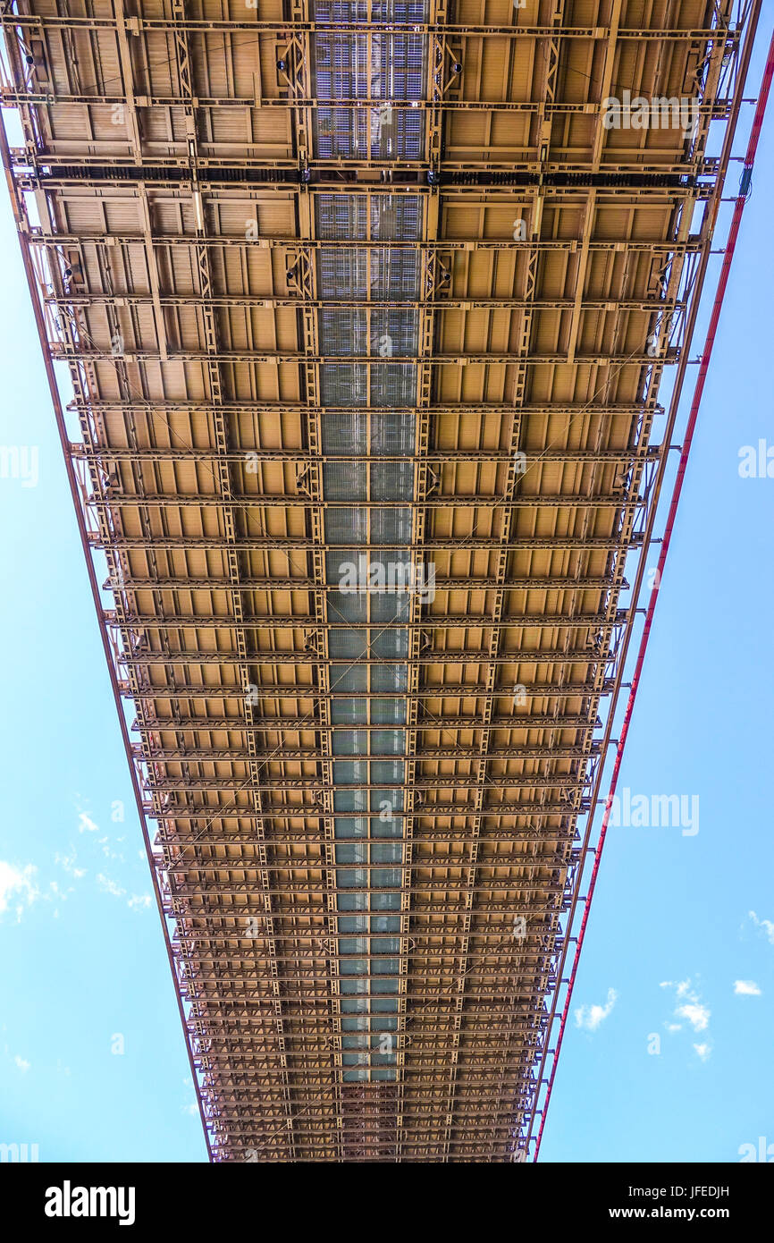 The amazing construction of Brooklyn Bridge New York from below Stock Photo