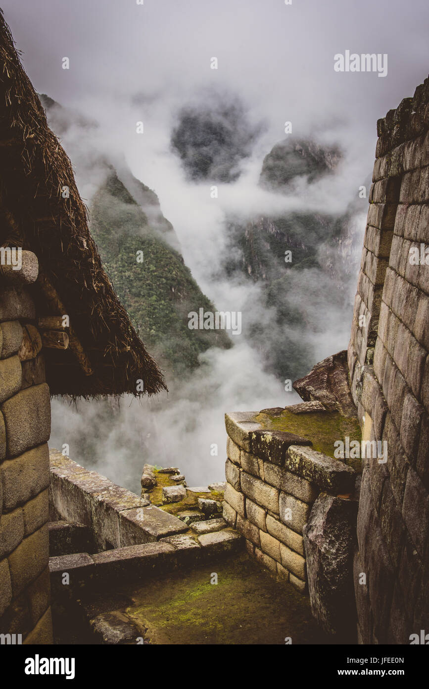 Machu Picchu ruins in the clouds Stock Photo - Alamy