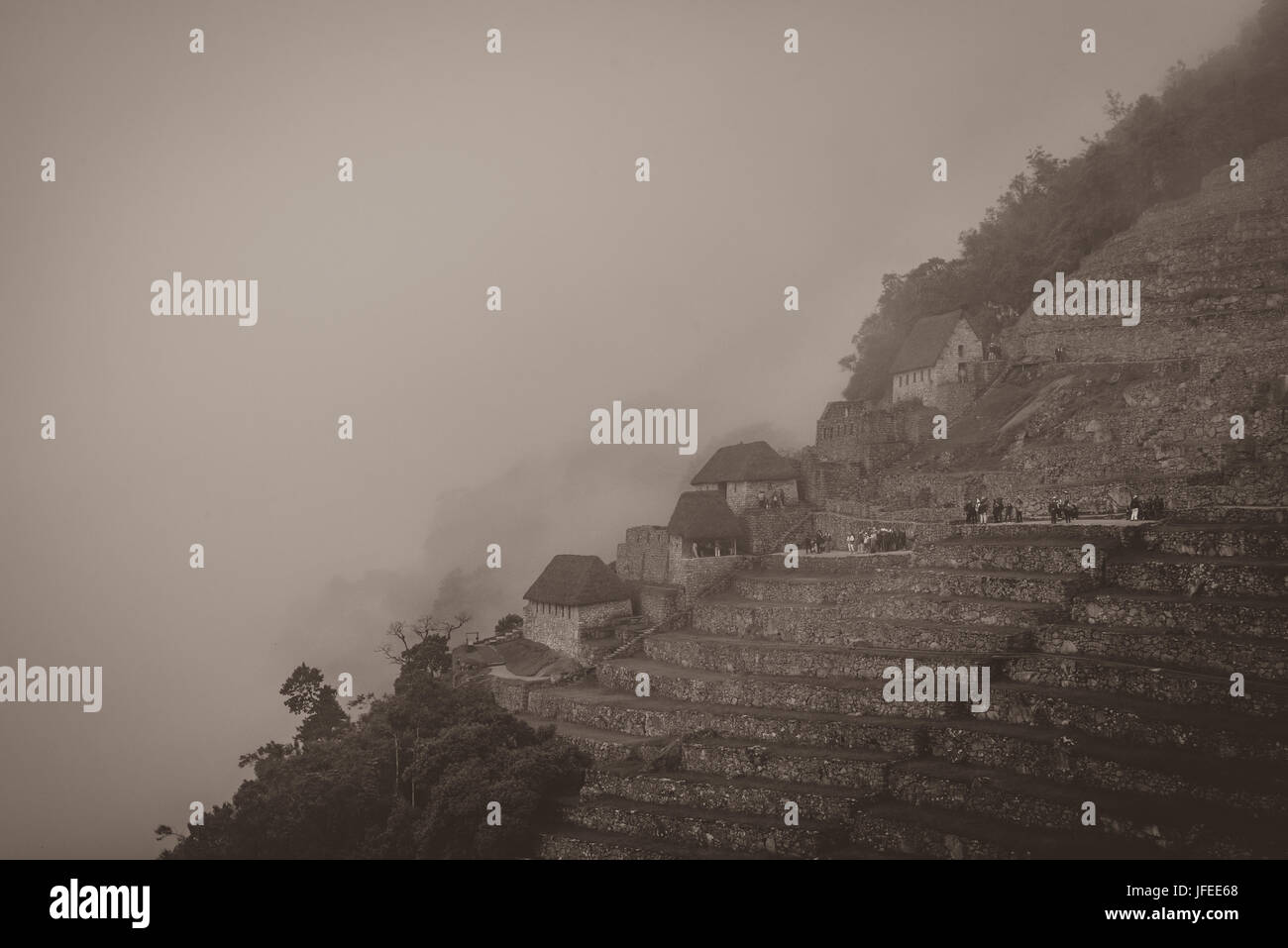 Machu Picchu ruins in the clouds Stock Photo - Alamy