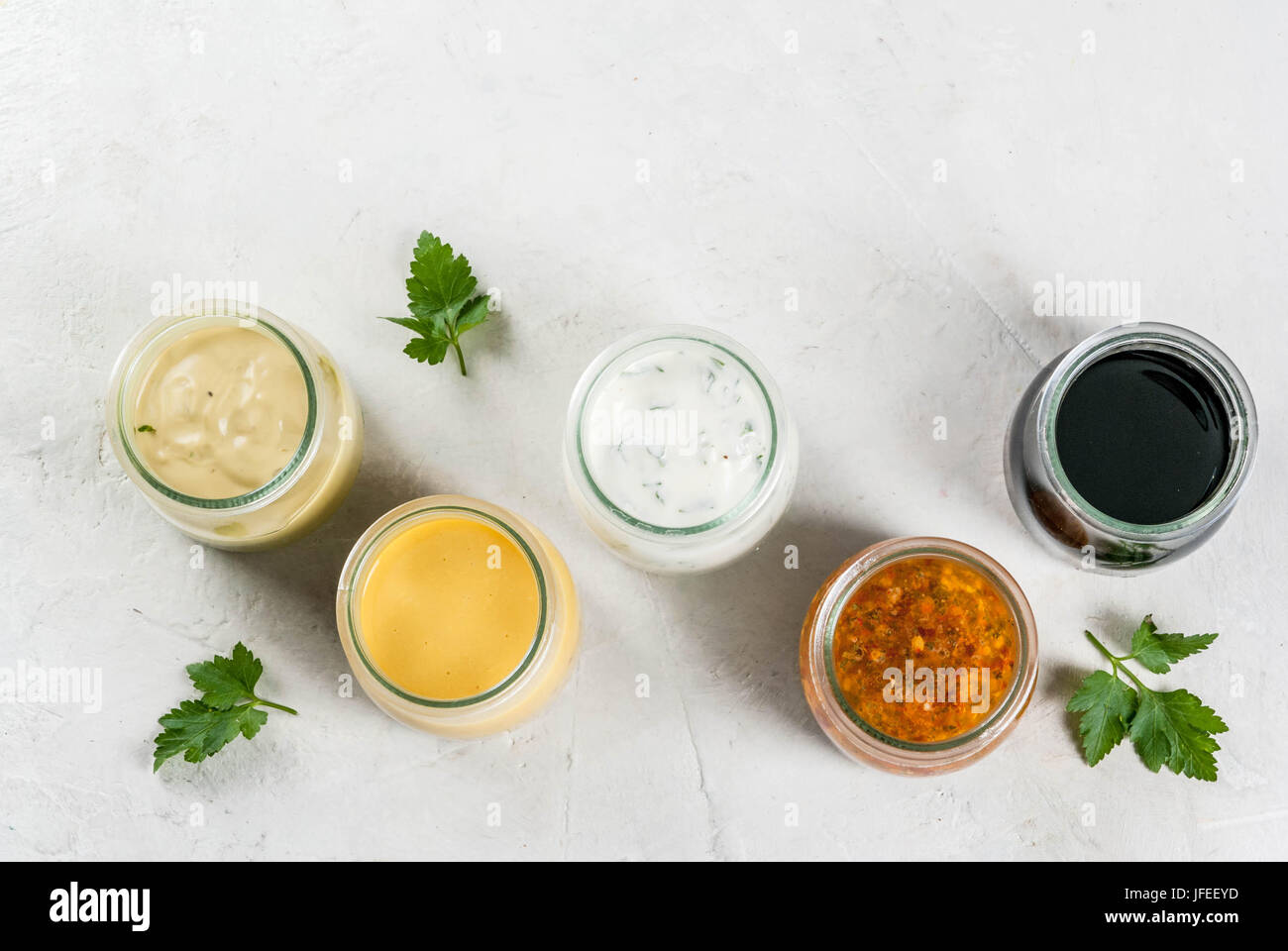 Set of dressings for salad sauce vinaigrette, mustard, mayonnaise or