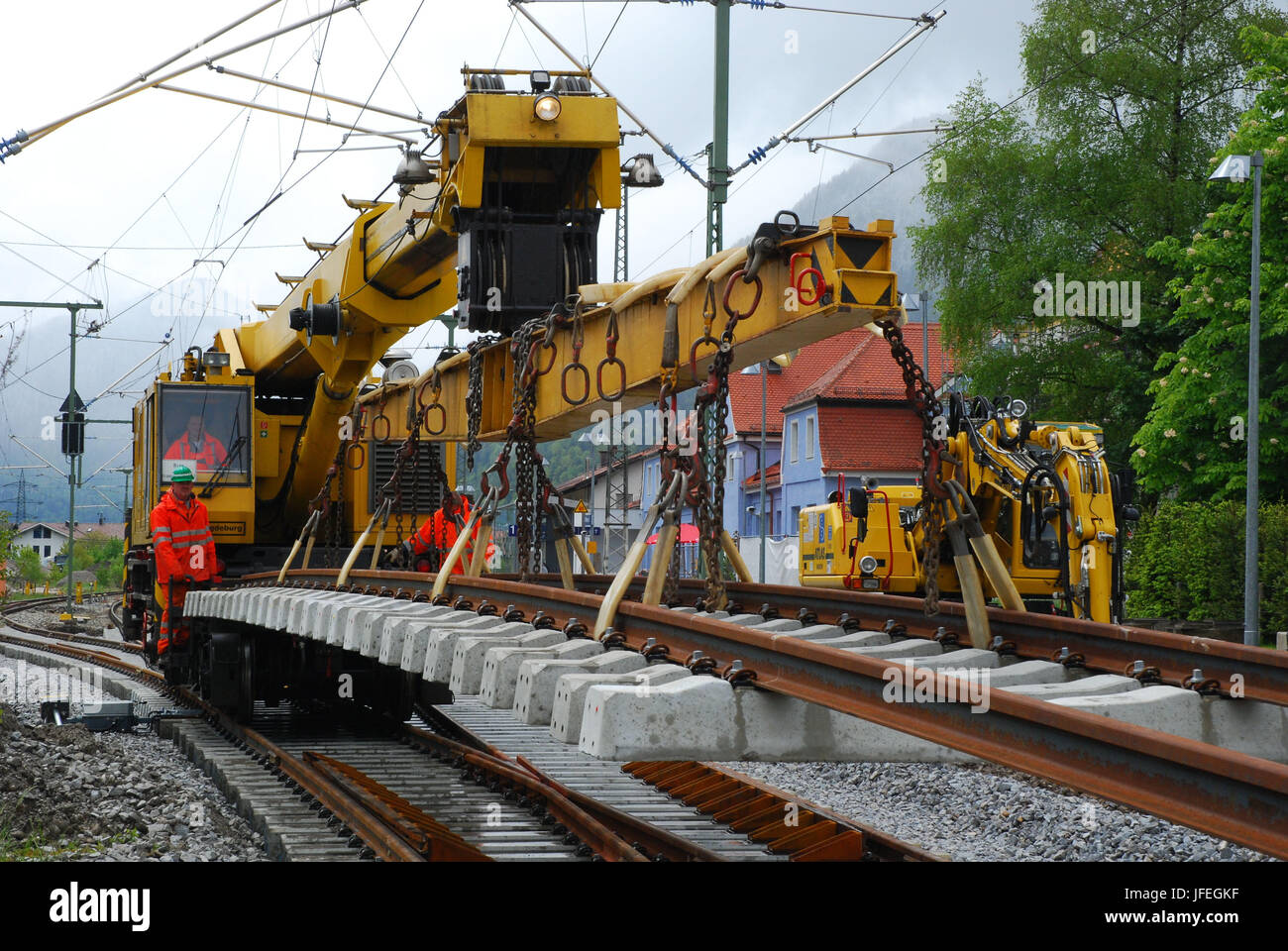 The German railways, track construction, railway worker, railway worker, load crane, rail transfer Stock Photo