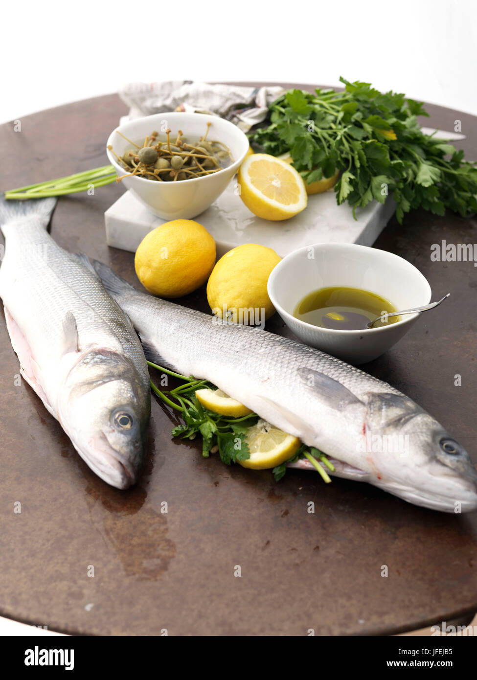 Fish, branzino or European sea bass, raw Stock Photo Alamy