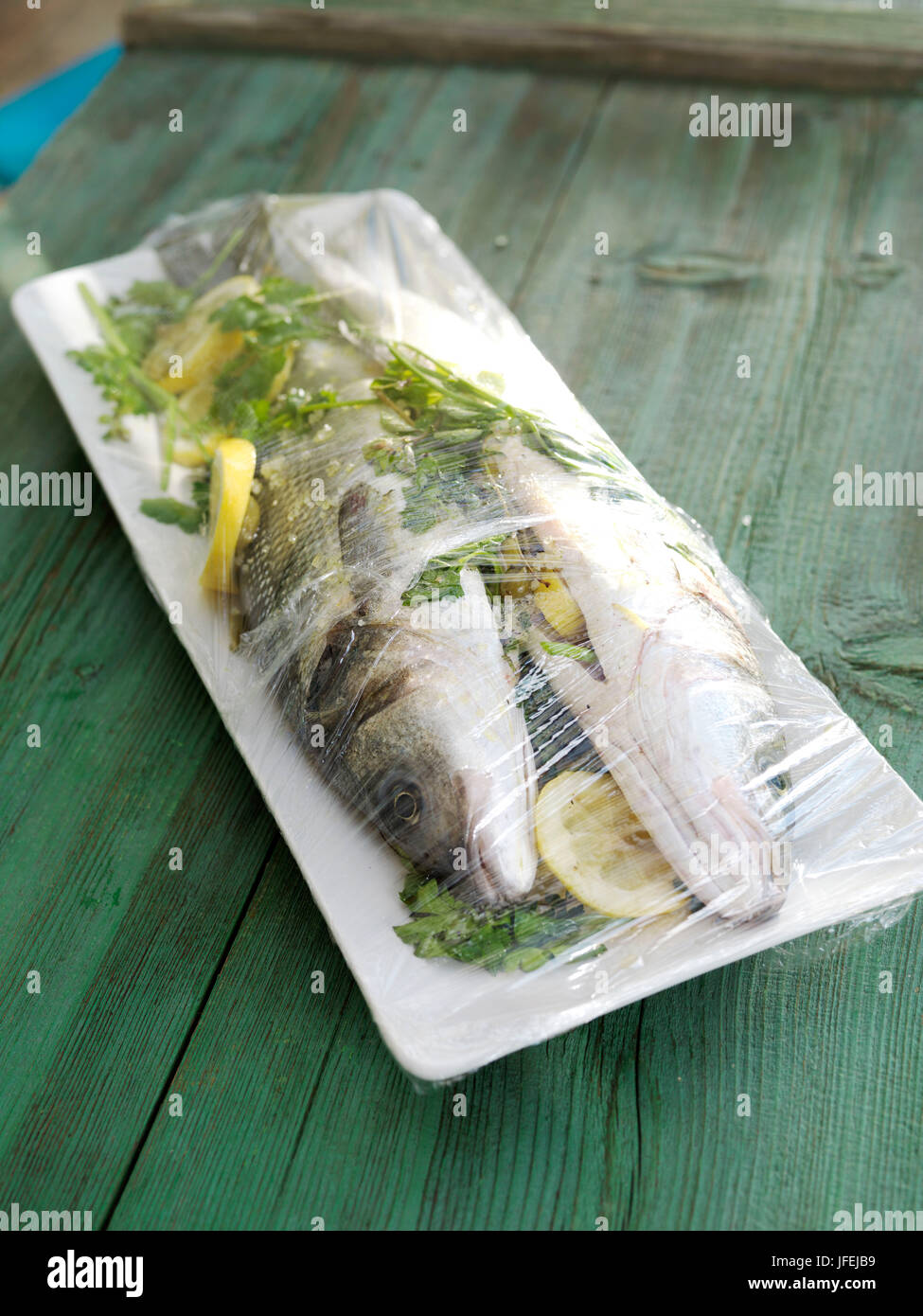 Fish, branzino or European sea bass, raw, spicy, transparency, Stock Photo