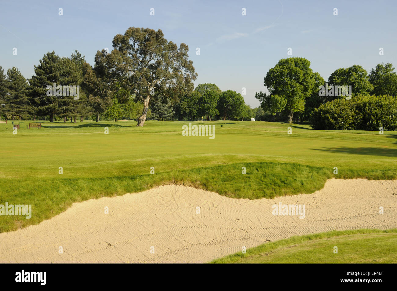 View of the 1st Green and bunker on JH Taylor Course Royal Mid-Surrey Golf Club Richmond Surrey England Stock Photo