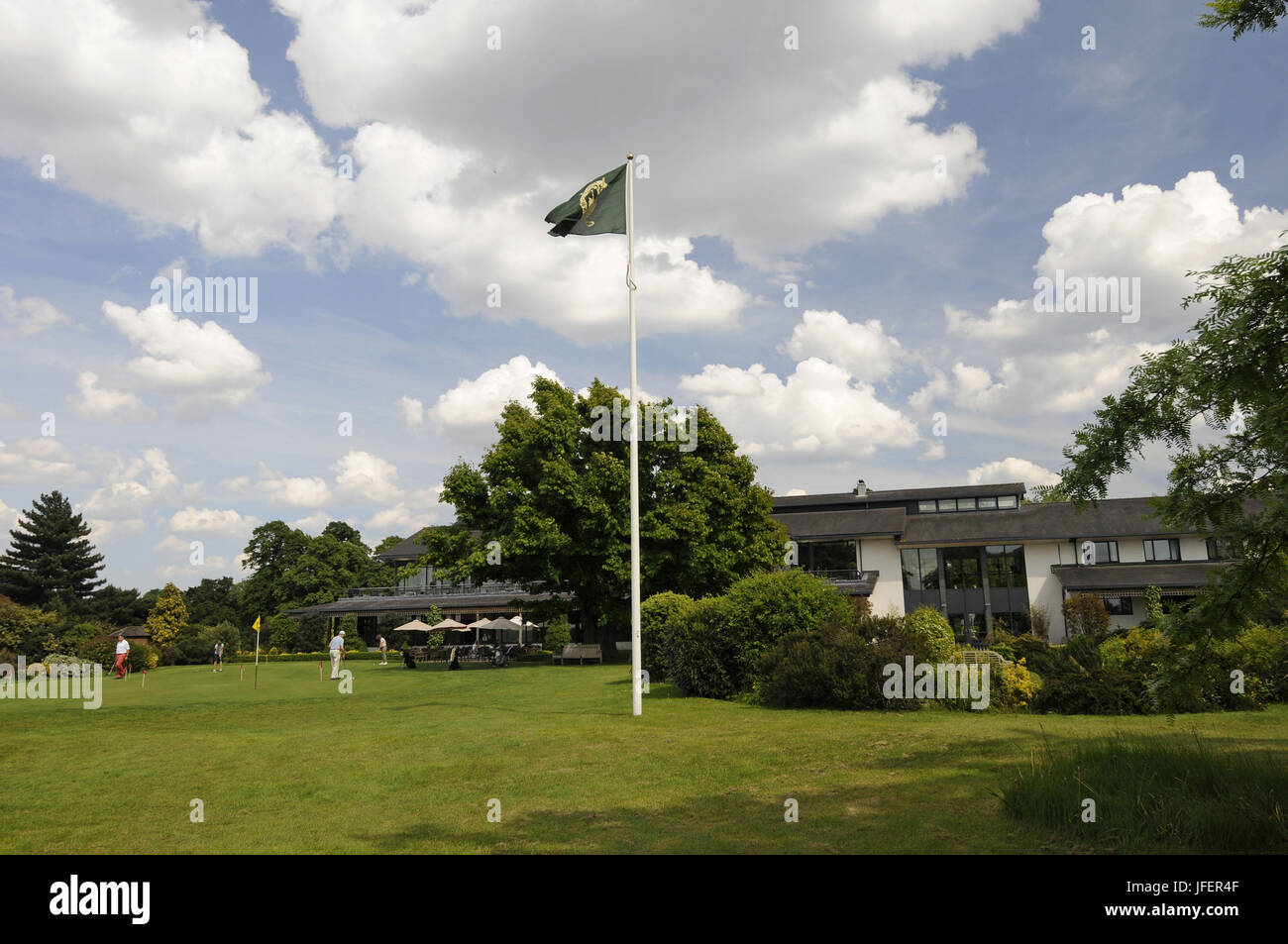 View of the Clubhouse with club flag Royal MidSurrey Golf Club