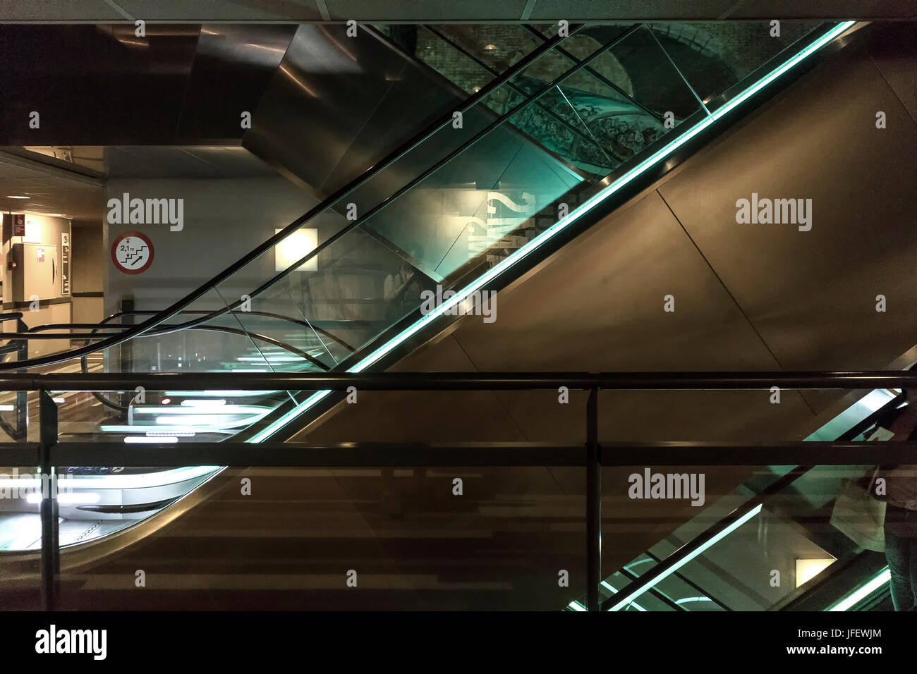 Escalators with green light Stock Photo Alamy