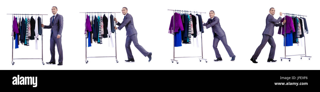 Businessman with rack of clothing Stock Photo - Alamy