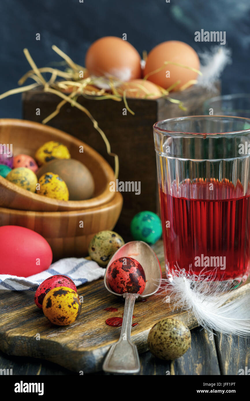 Eggs and glass jars of paint. Easter. Stock Photo