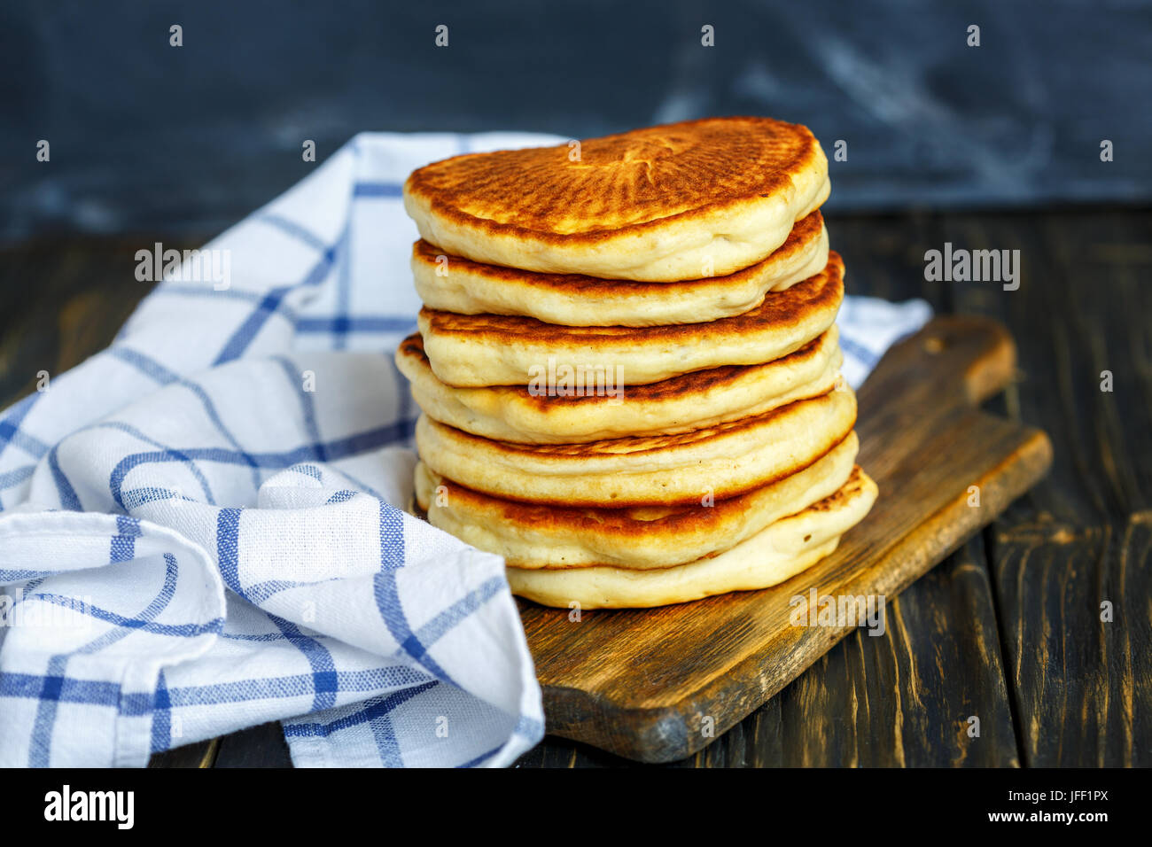 Tasty Pancake and kitchen towel. Stock Photo