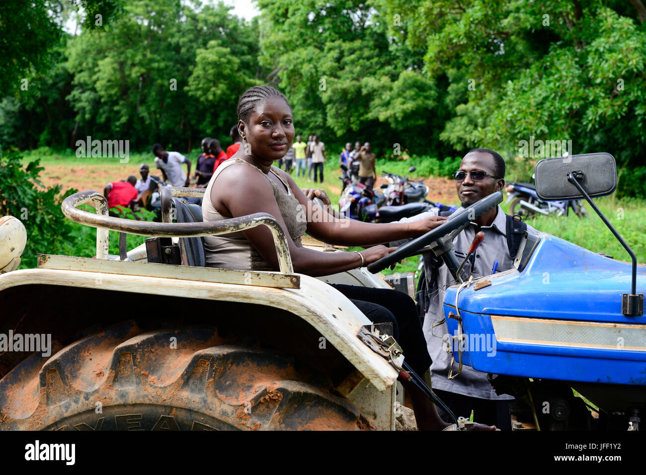 BURKINA FASO, Bobo Dioulasso, agricultural institute CAP-M, tractor training, woman Bebeni Kienou driving tractor Stock Photo