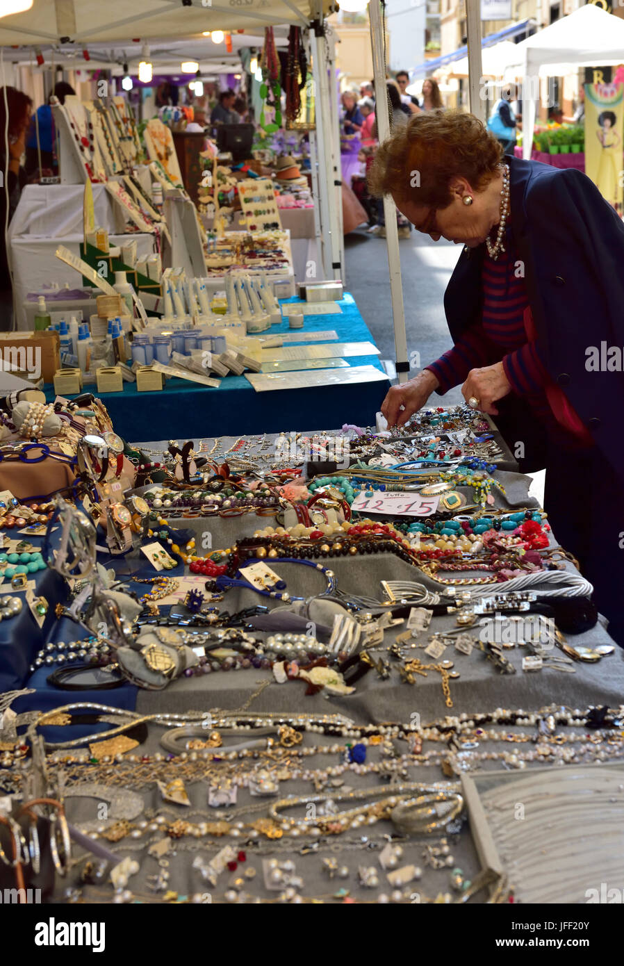 Market stall selling jewellery in the centre of Anzio, Italy Stock Photo