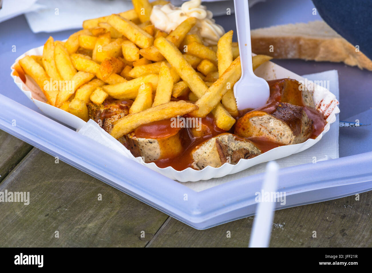 German currywurst with french fries Stock Photo