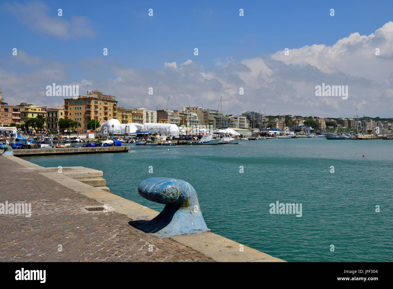 Quayside and port of Anzio, Italy, with flats, hotels and town
