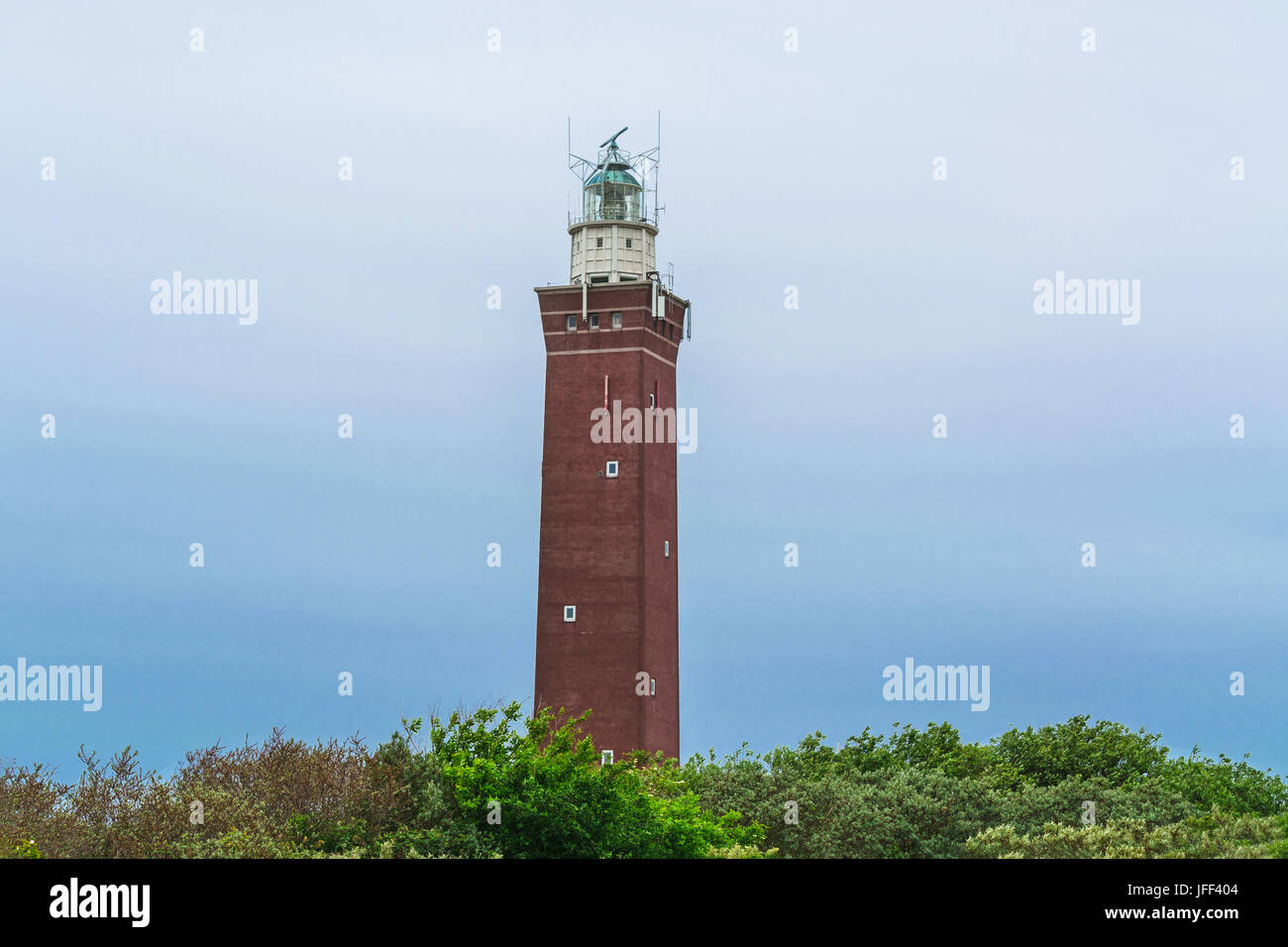 Quadrangular Lighthouse in the dunes Stock Photo