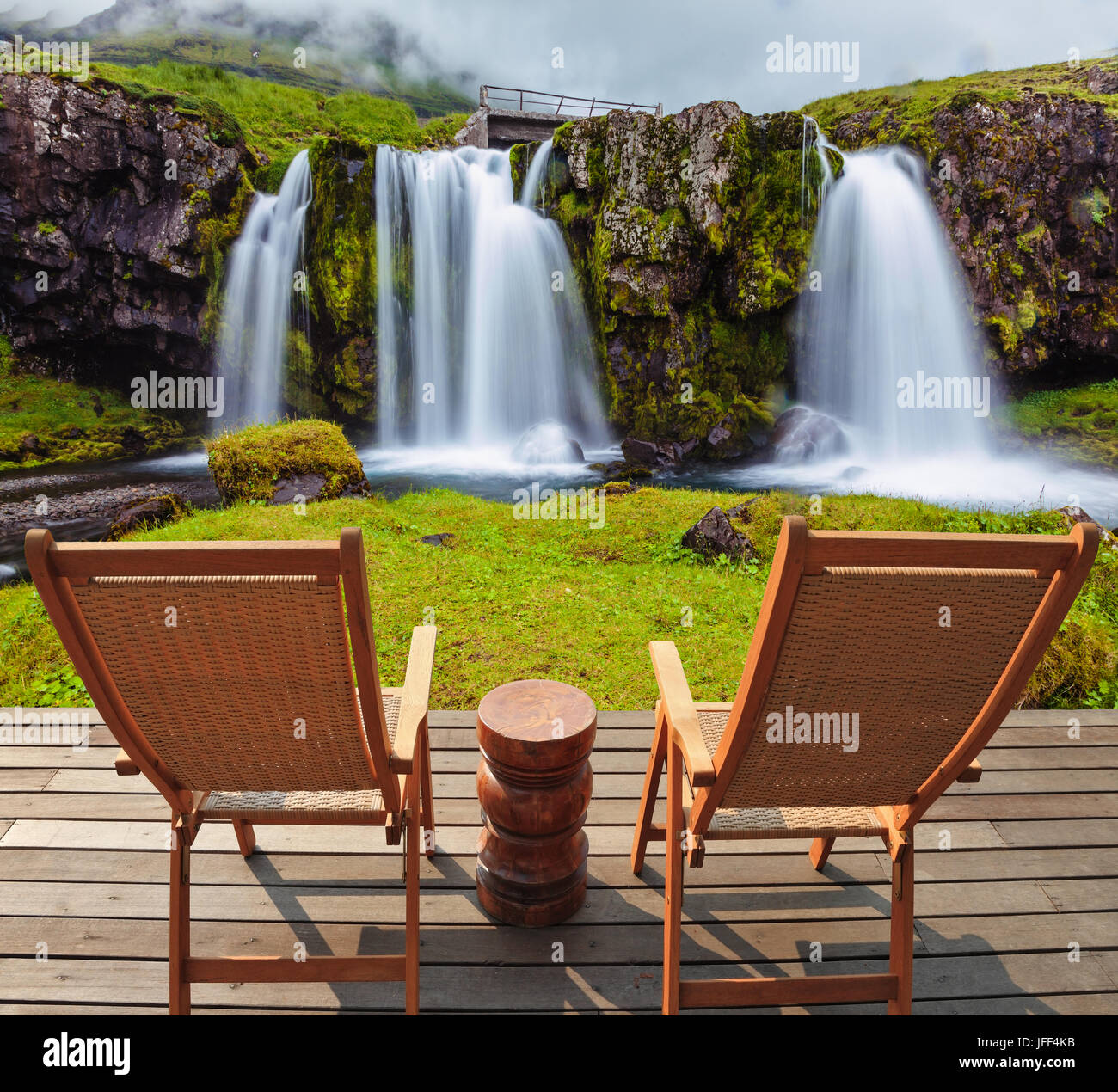Deck chairs on wooden platform Stock Photo - Alamy