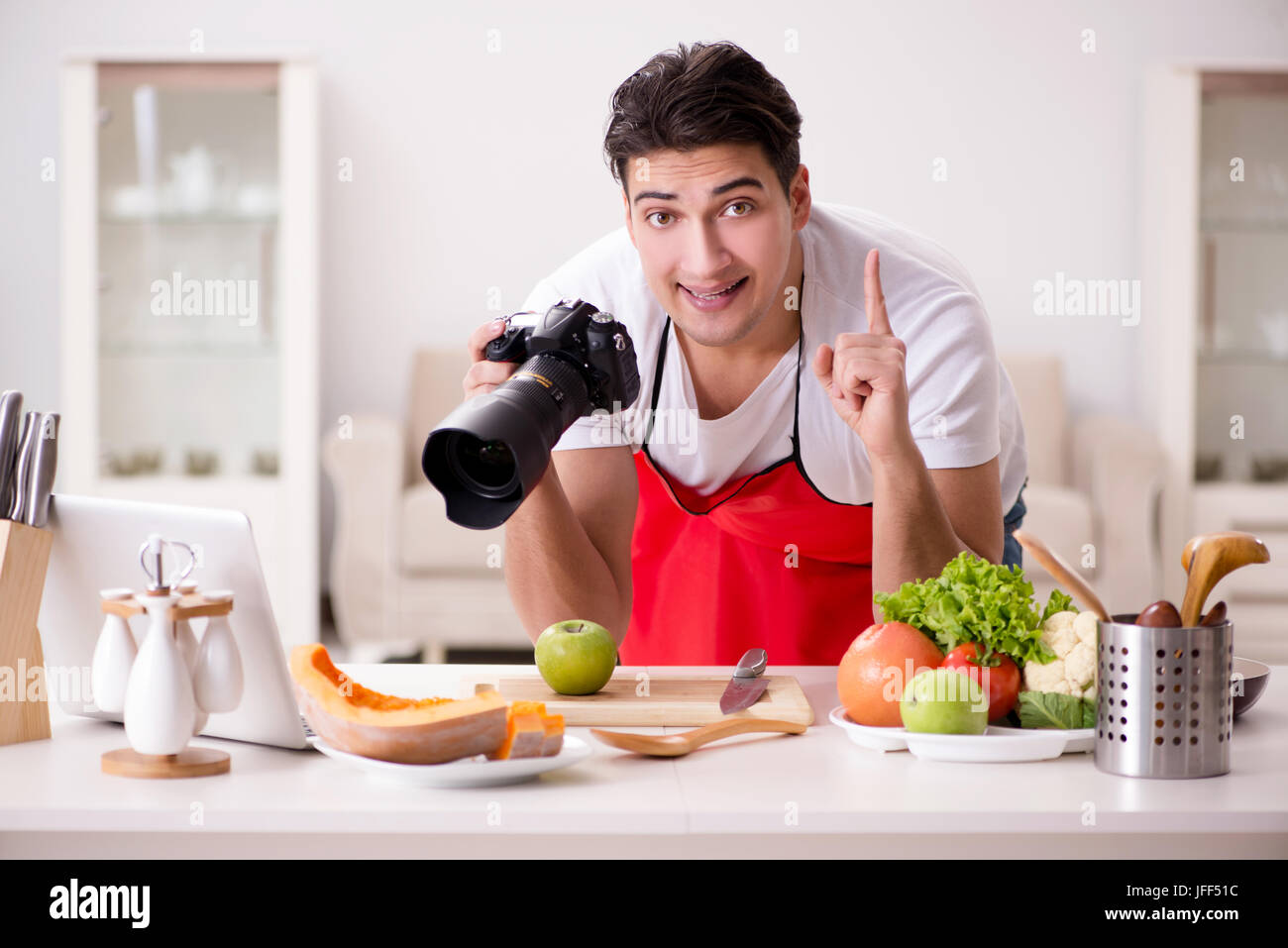 Food Blogger Photo Food blogger working in the kitchen Stock Photo - Alamy