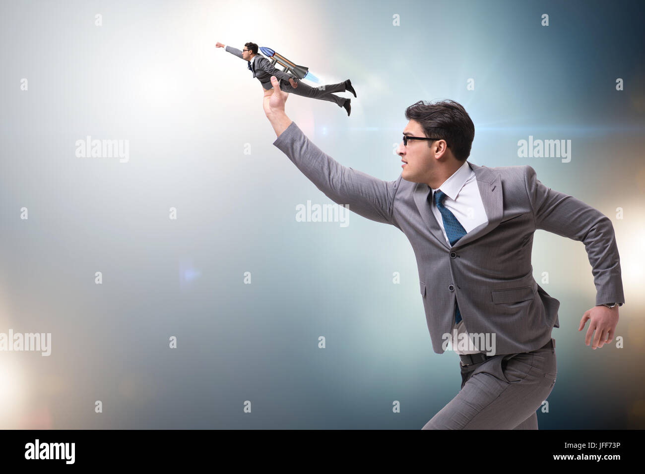 Businessman in start up business concept Stock Photo - Alamy
