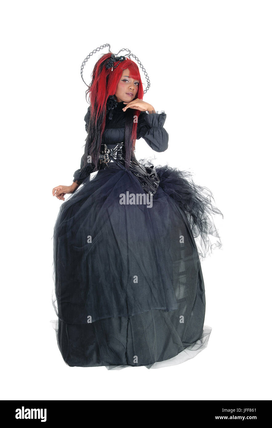 African woman in Victorian black dress. Stock Photo