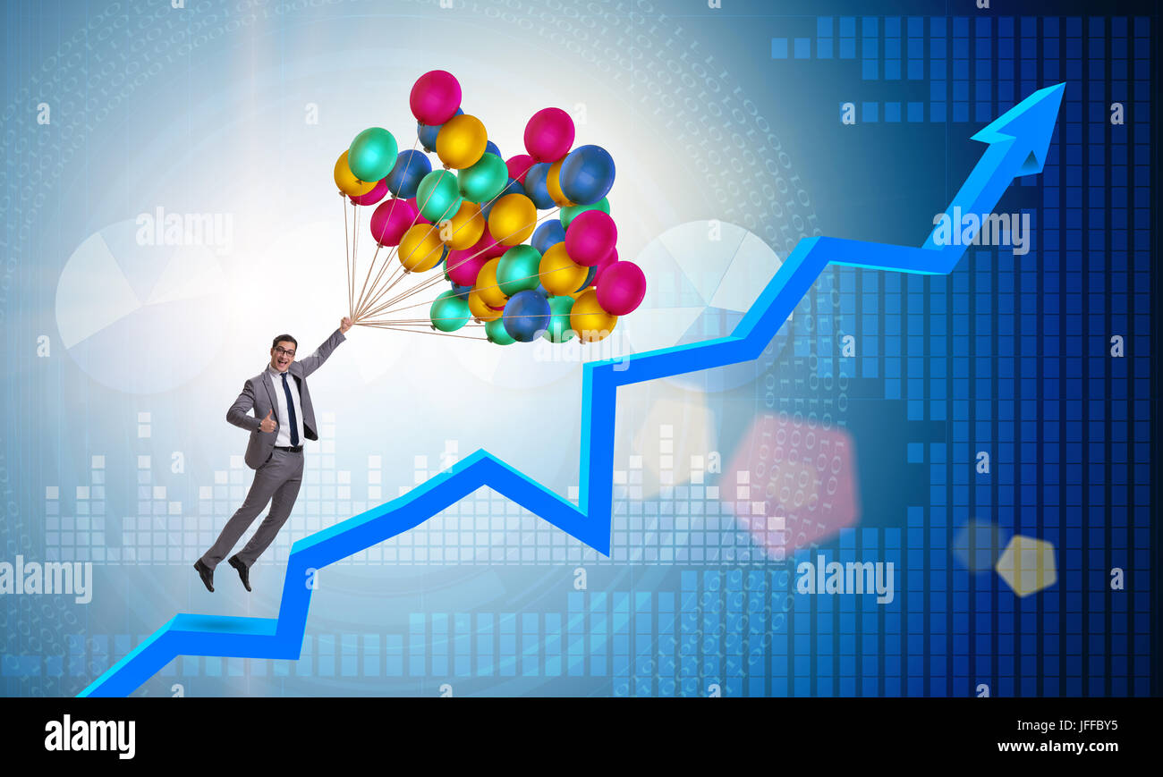 Graph Balloons Rising Businessman flying on balloons over graph Stock Photo - Alamy