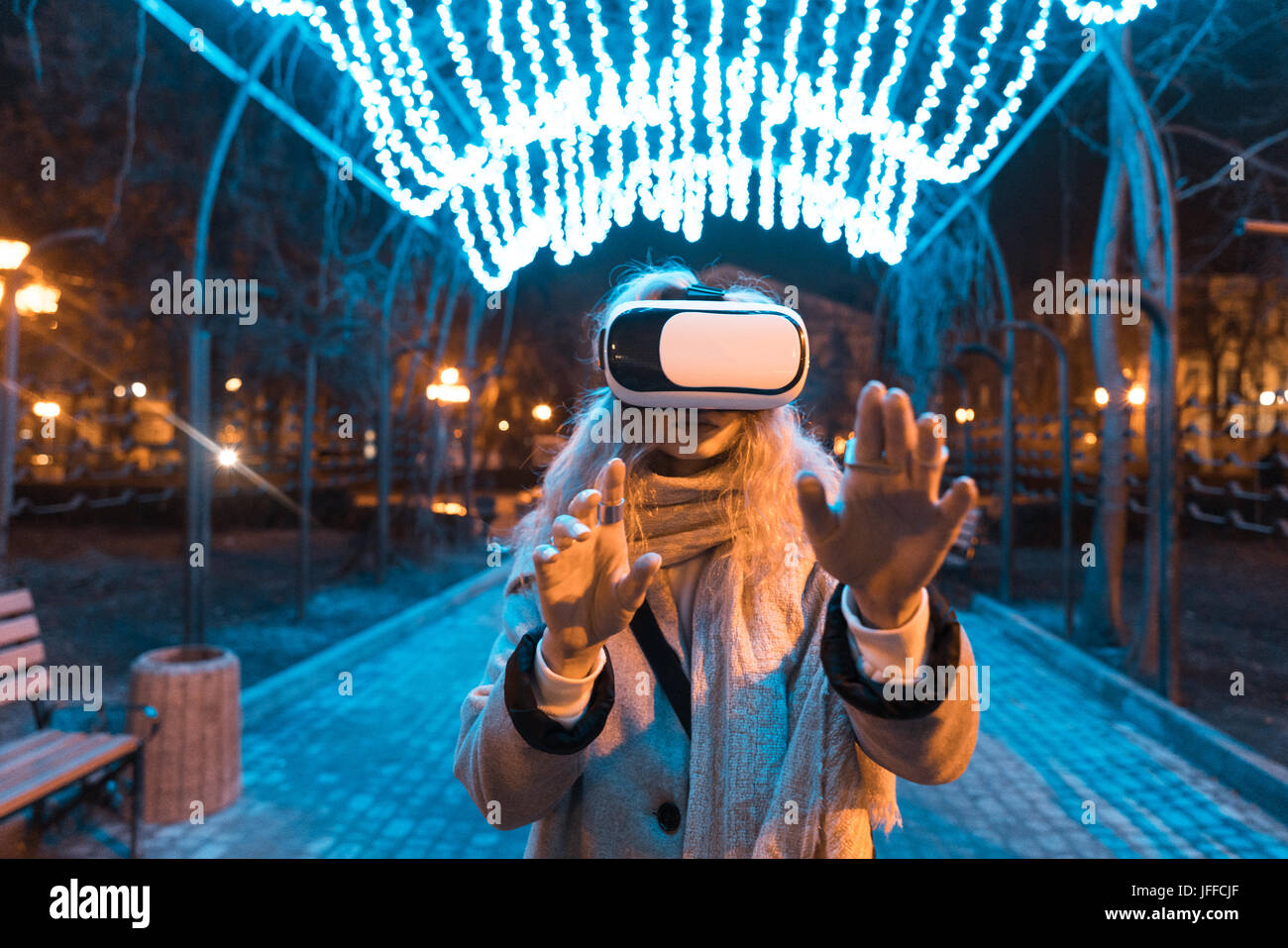 Young girl getting experience VR headset Stock Photo - Alamy