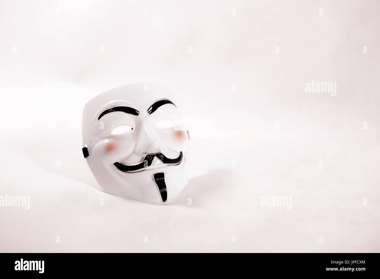 white anonymous mask on white background Stock Photo - Alamy