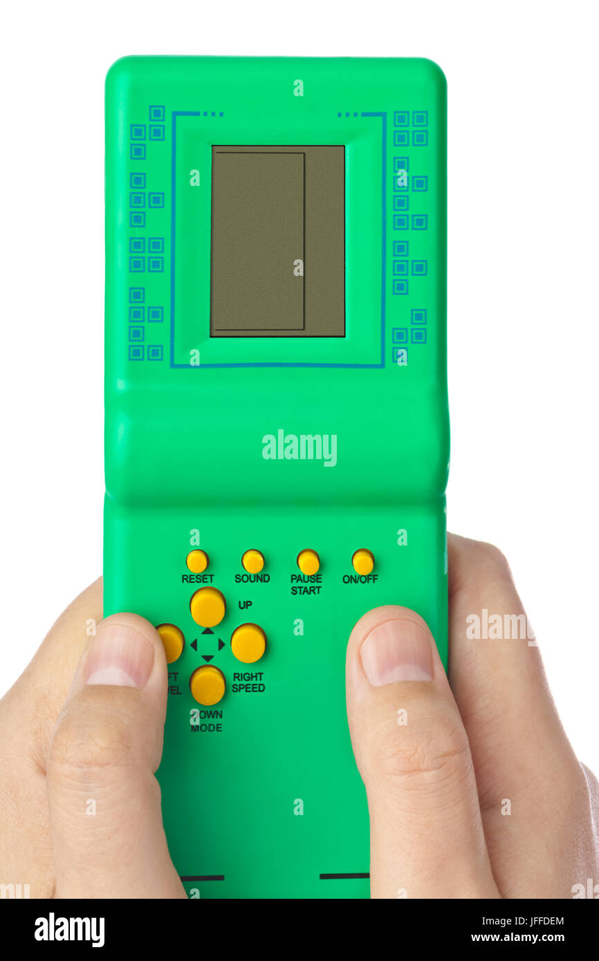 Hands with electronic tetris game Stock Photo