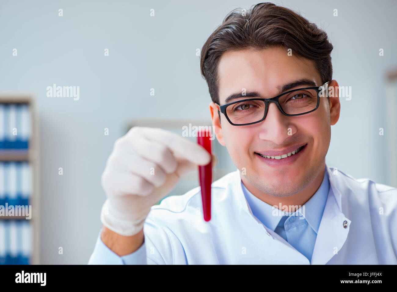 Doctor working with blood samples Stock Photo Alamy