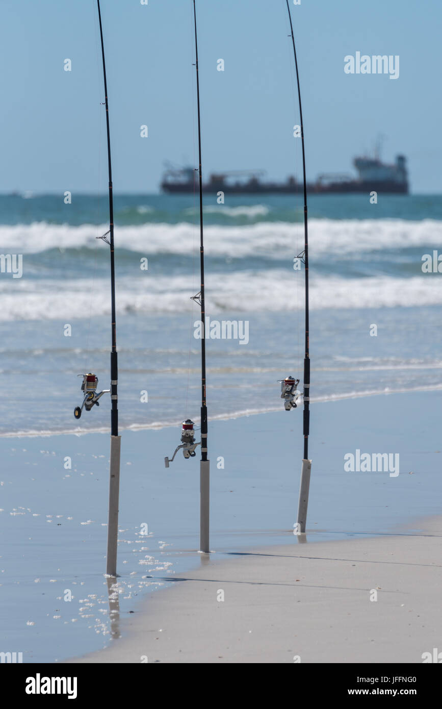 Surf fishing rods and reels at Jacksonville Beach in Northeast Florida. (USA) Stock Photo