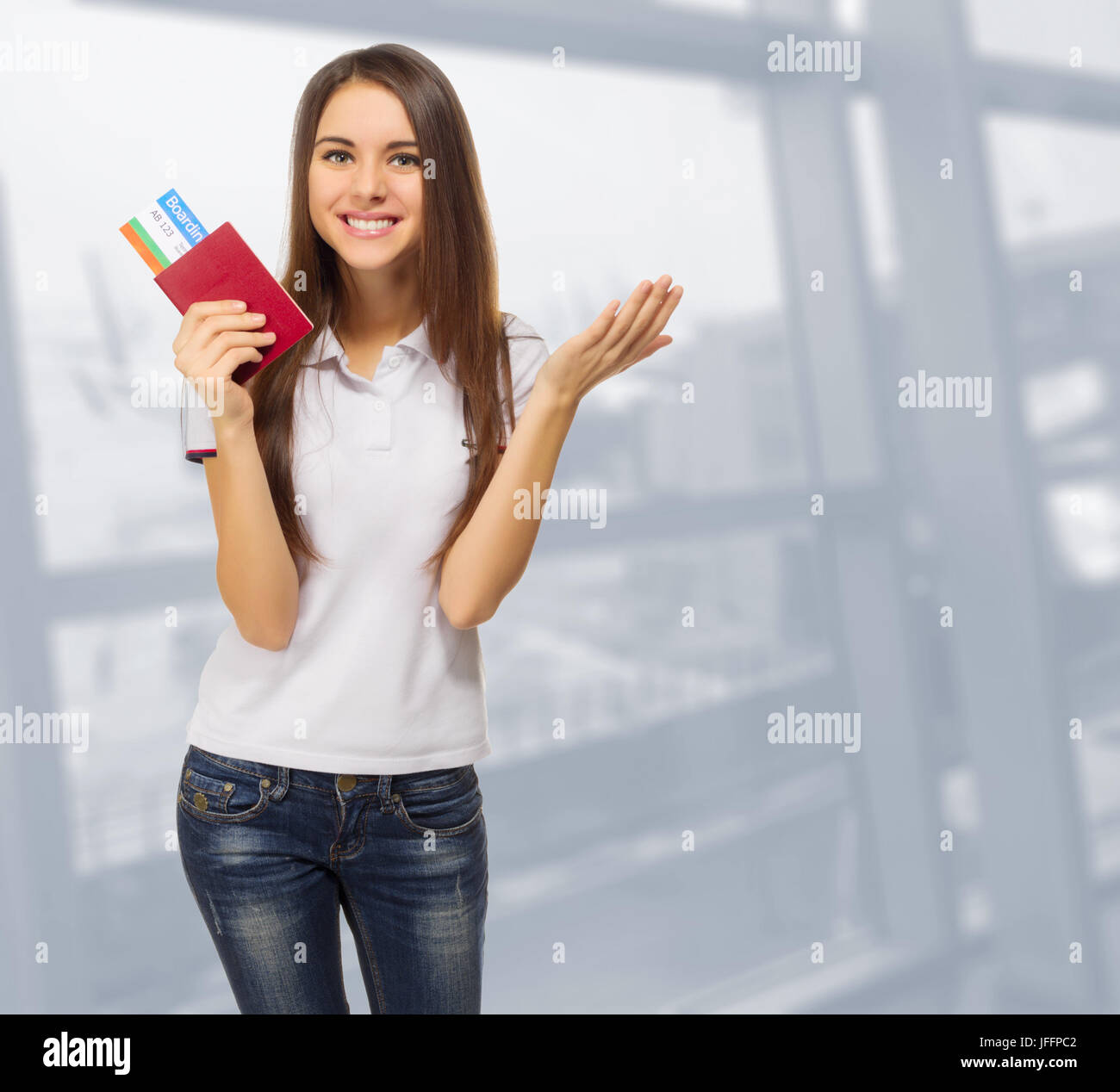 Young travelling woman in airport Stock Photo