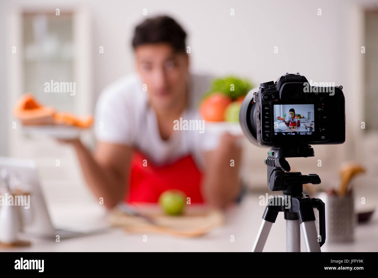 Food Blogger Photo Food blogger working in the kitchen Stock Photo - Alamy
