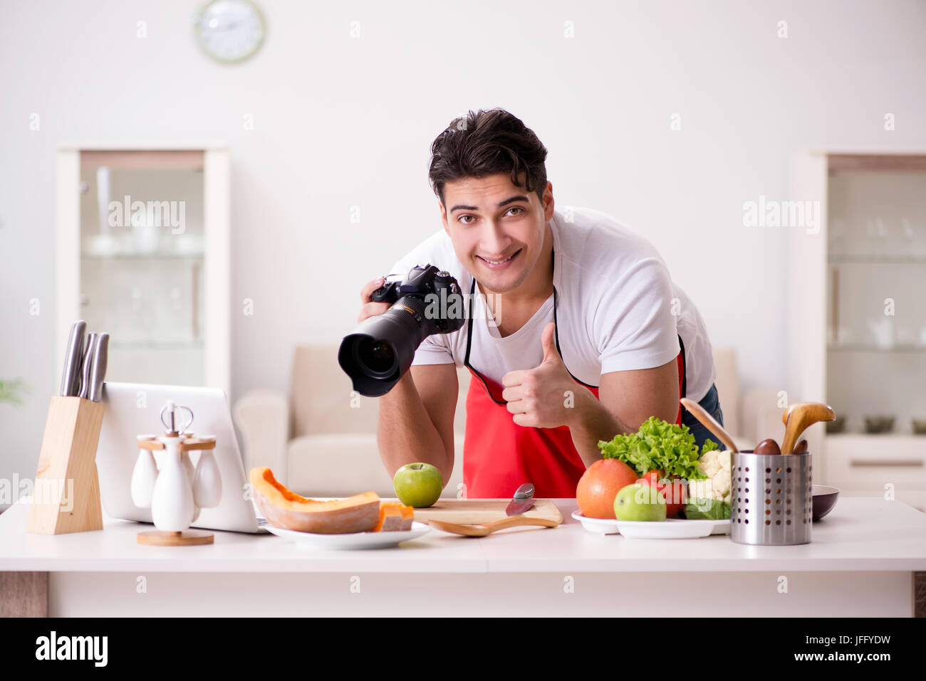 Food Blogger Photo Food blogger working in the kitchen Stock Photo - Alamy
