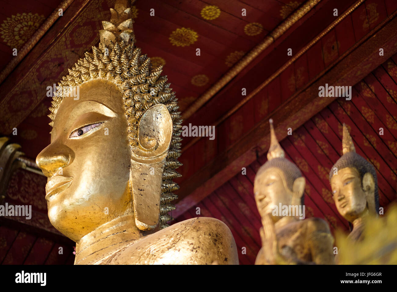 Buddha heads at Wat Mai Suwannaphumaham (aka Vat May) temple, Luang Prabang, Laos, Asia Stock Photo