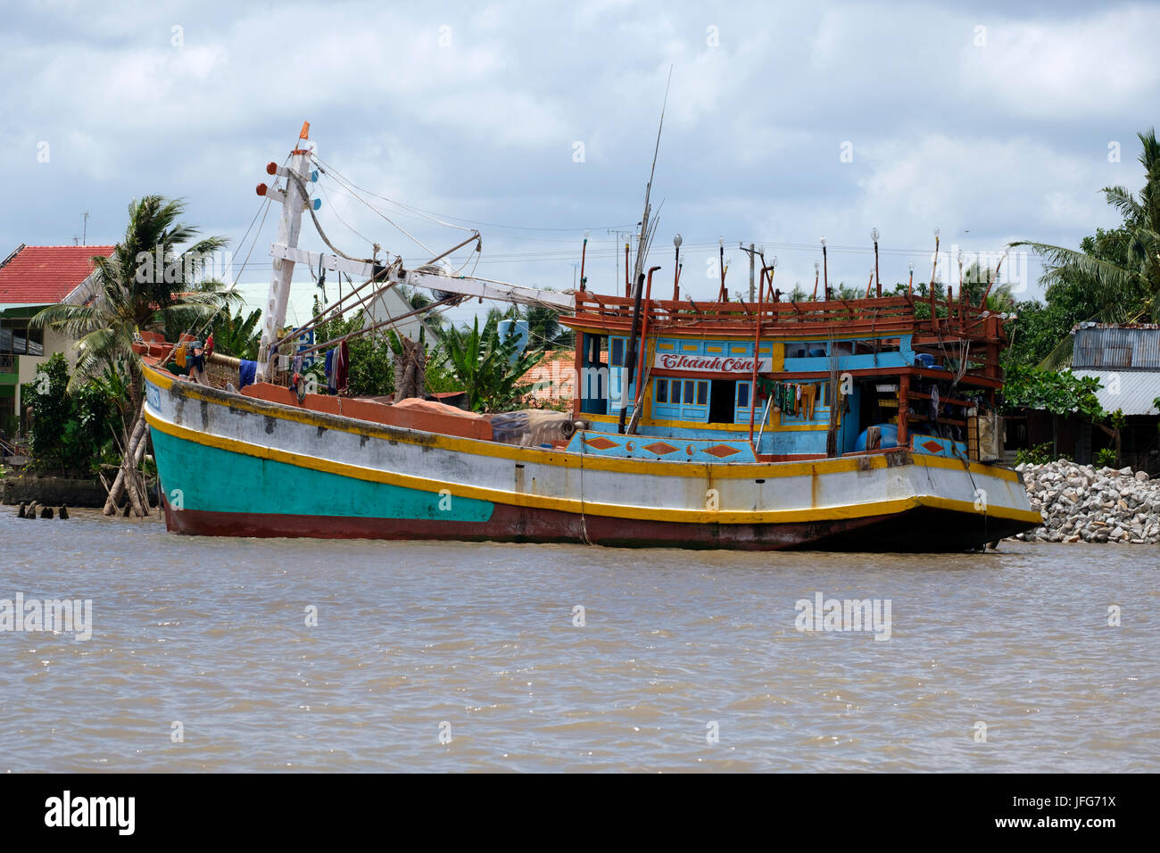 Colorful fishing boat on the Mekong river Stock Photo