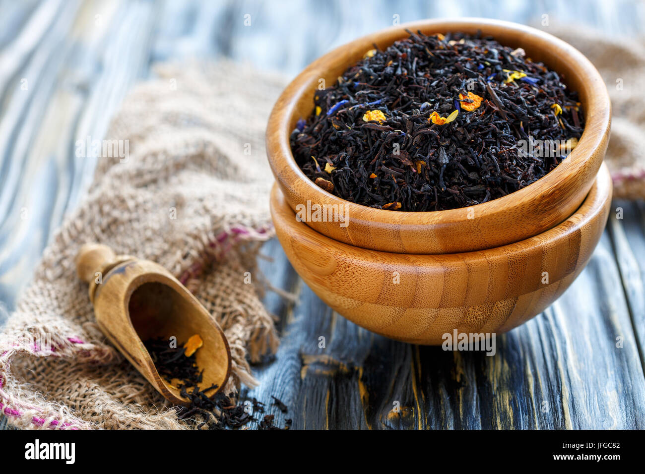 Black tea with bergamot in a wooden bowls Stock Photo Alamy