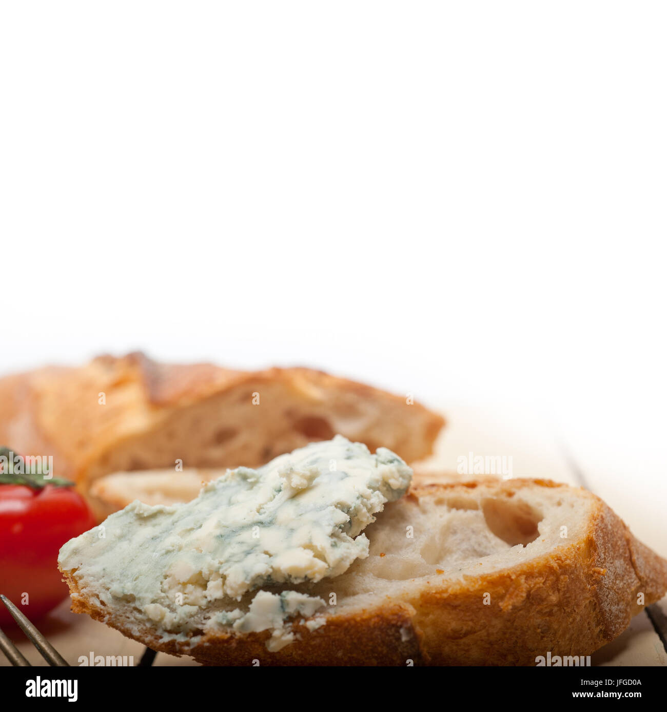 fresh blue cheese spread ove french baguette Stock Photo Alamy