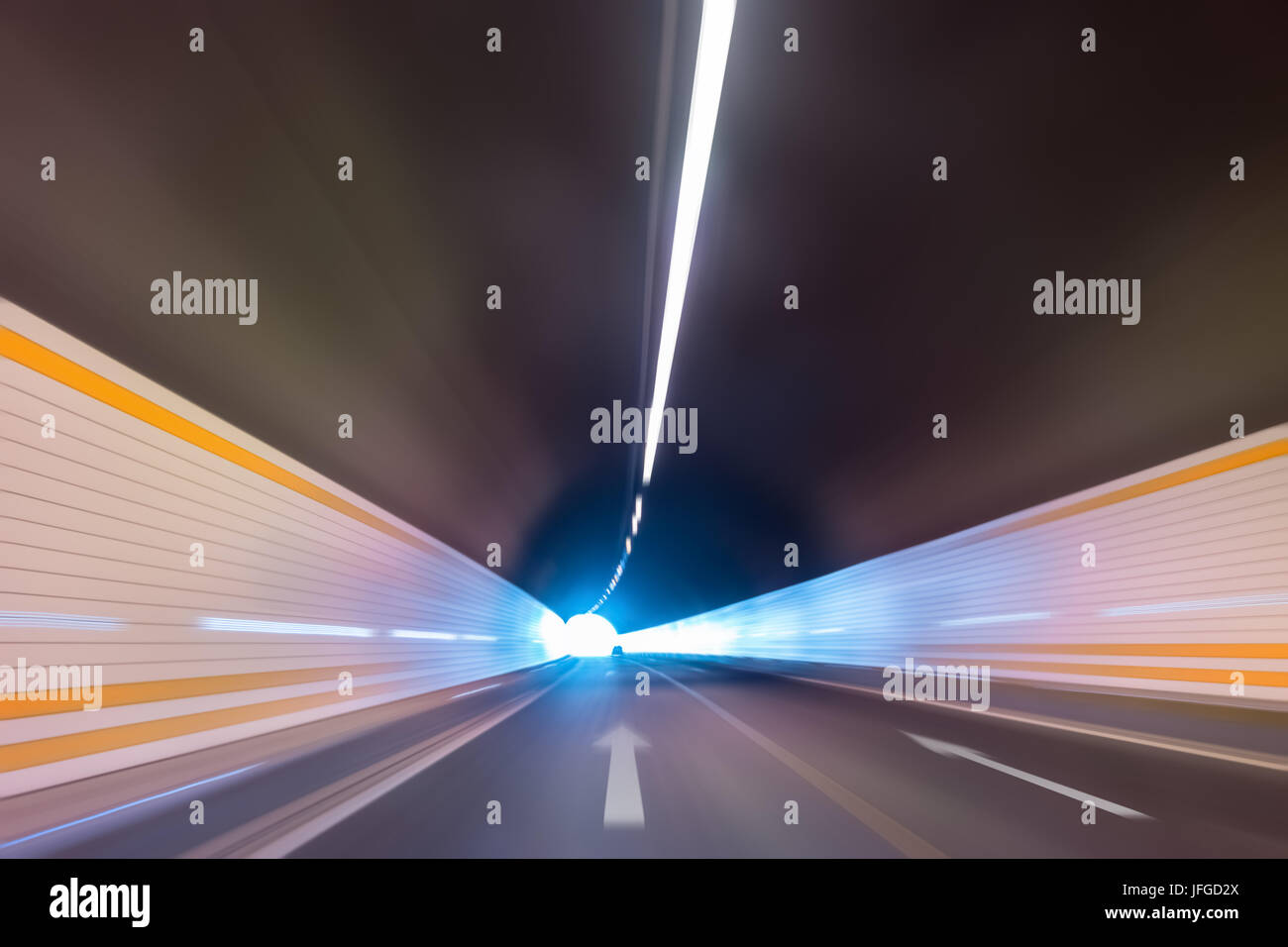 highway tunnel with car driving motion blur Stock Photo