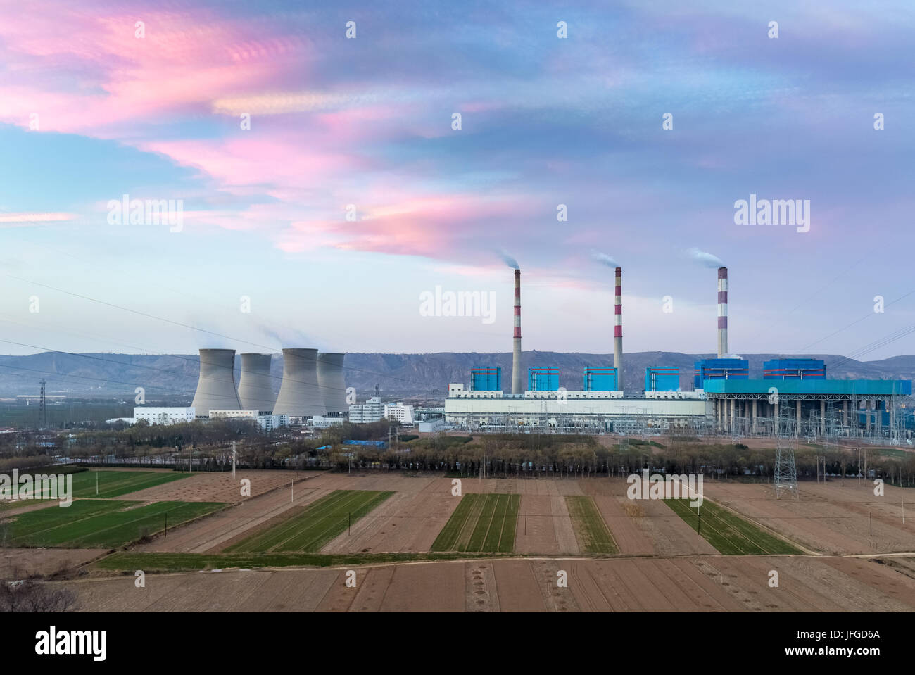 thermal power plant in sunset Stock Photo