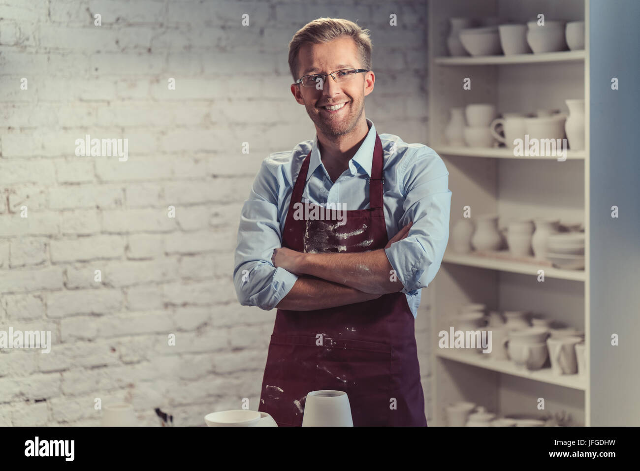 Smiling worker hi-res stock photography and images - Alamy