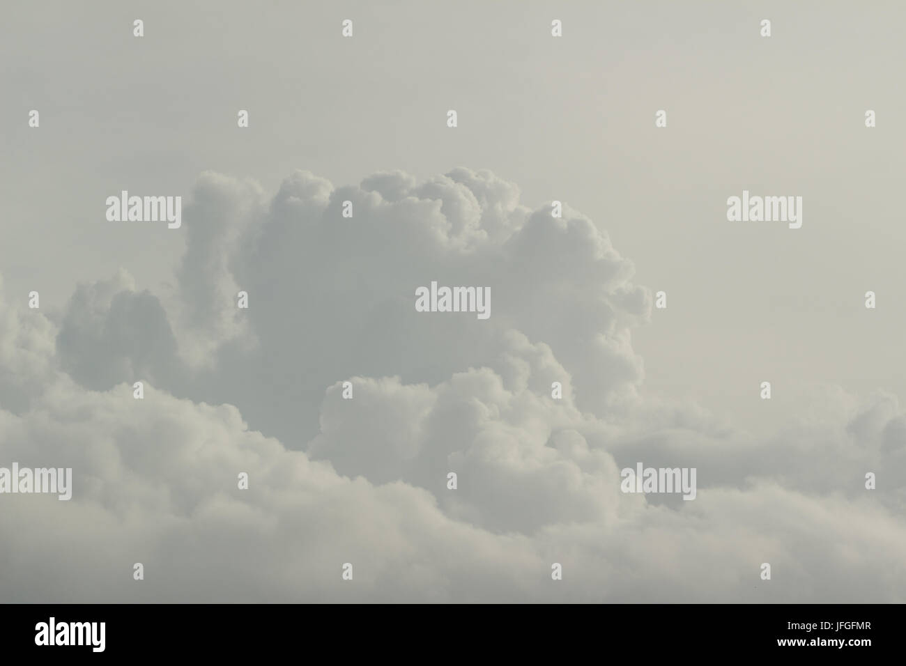 Cloudscape - white clouds over the sky; high key; Stock Photo