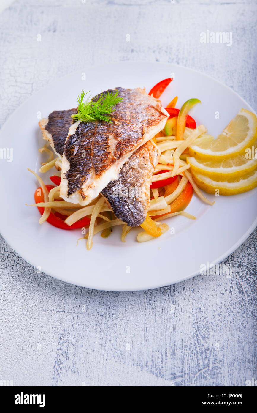 Sea Bream fish with vegetables Stock Photo