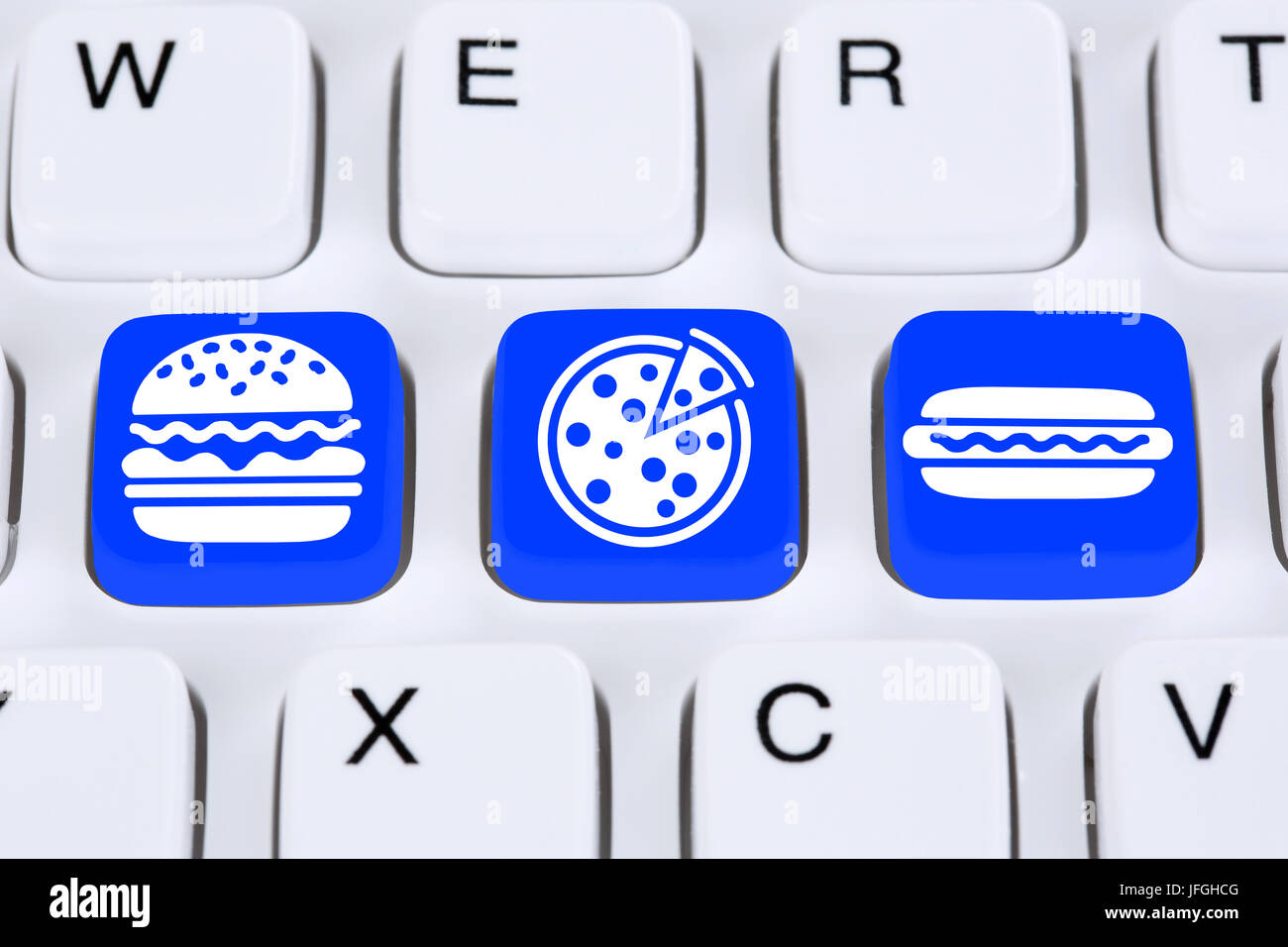 Pizza Hamburger Fast Food essen online bestellen und liefern im Internet Computer Stock Photo