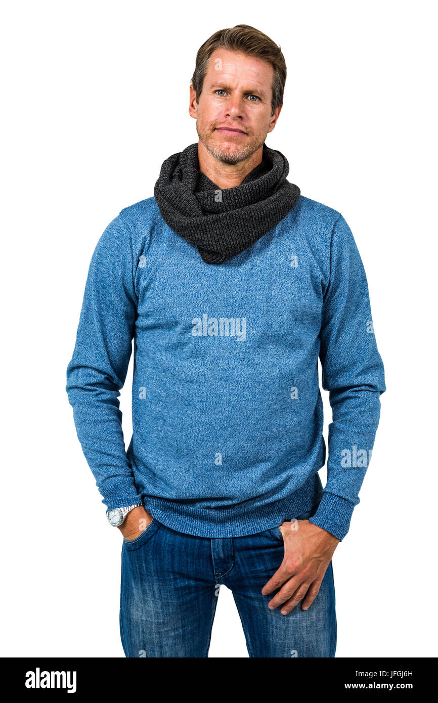 Confident man standing against white background Stock Photo - Alamy