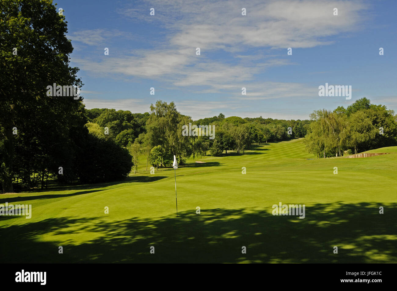 View back over 13th Green to Fairway East Course, Sundridge Park Golf Club, Bromley, Kent, England Stock Photo