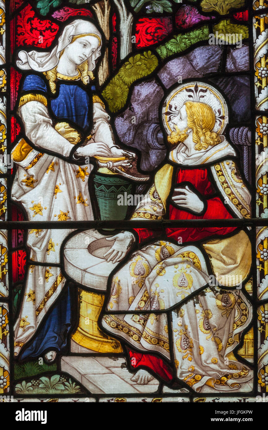 England, Yorkshire, Howarth, St.Michael and All Angels Church, Stained Glass Window depicting Biblical Scene Stock Photo